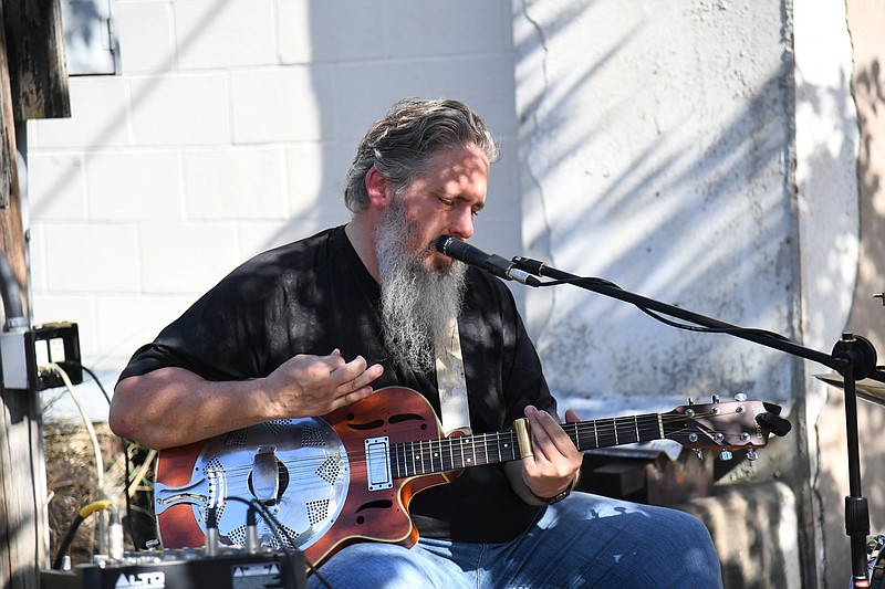 Greg Binns performs at a Bridge Street LIVE! event on June 3, 2021. - File photo by The Sentinel-Record