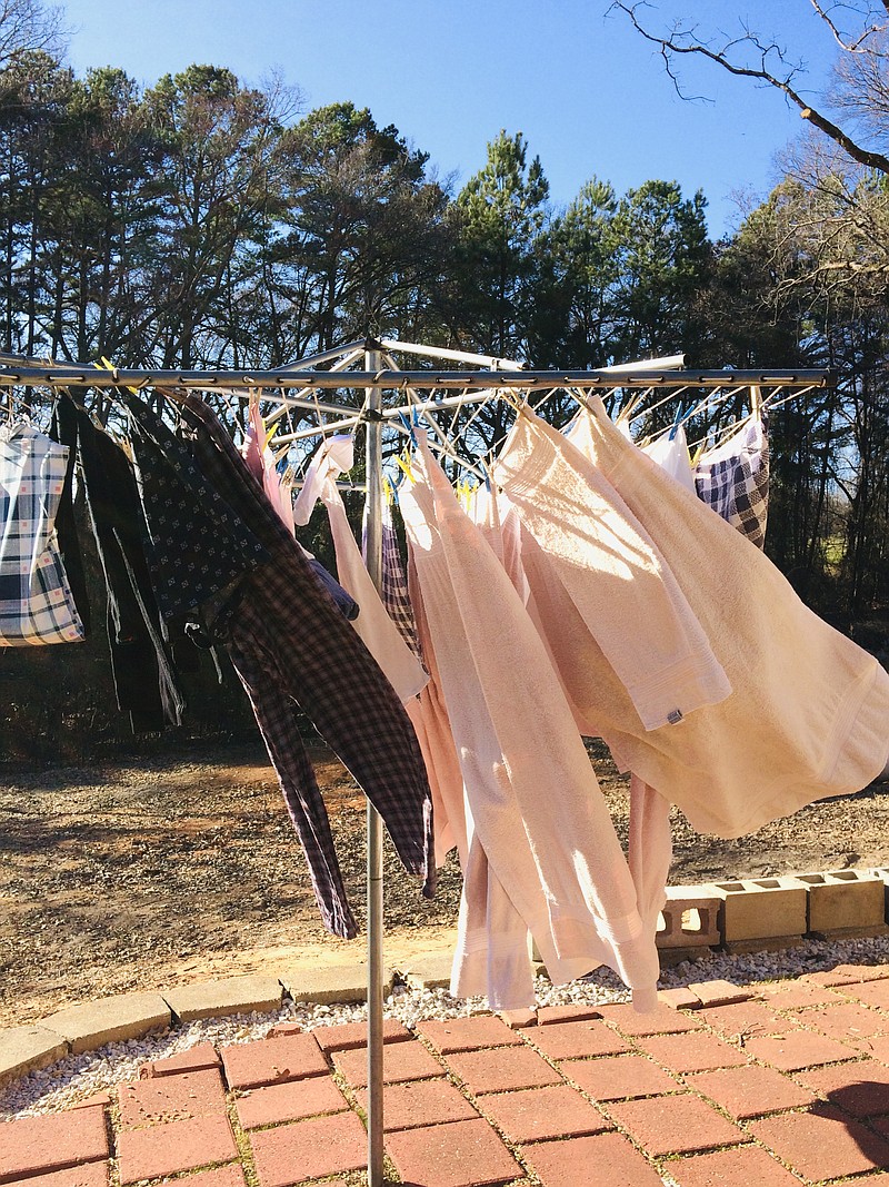 Columnist John Moore and his wife still use a clothesline, especially for drying sheets. (Photo by Teresa Moore)