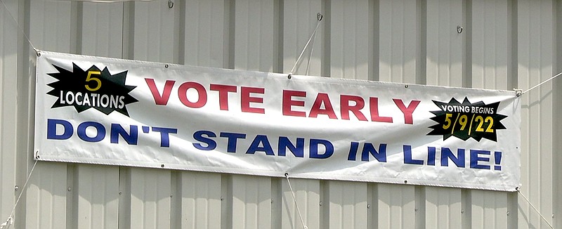 A sign promoting early voting hangs from the Garland County Election Commission Building. - File photo by The Sentinel-Record