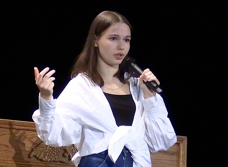 Former Ukrainian foreign exchange student Mariia Dudinova shares her experience of being in the midst of the Russian invasion of Ukraine and fleeing to Poland by train with her cousin Friday at Lakeside High School. - Photo by Donald Cross of The Sentinel-Record