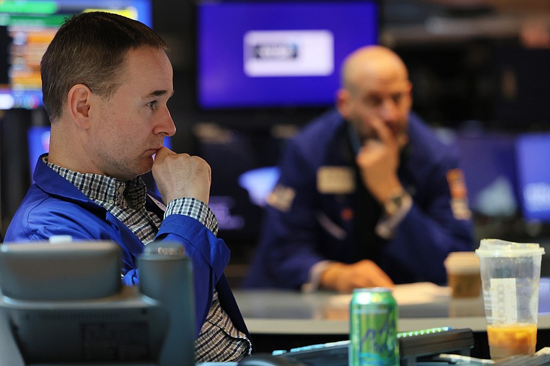 Traders work on the floor of the New York Stock Exchange during morning trading on April 12, 2022 in New York City. (Michael M. Santiago/Getty Images/TNS)