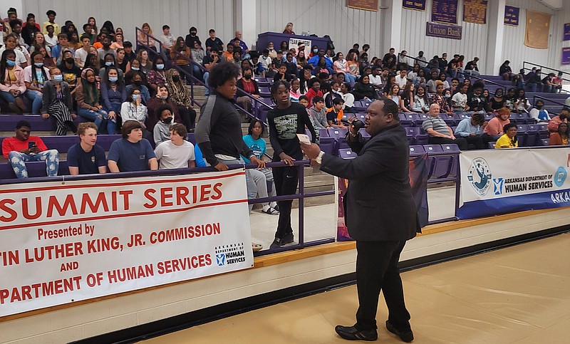 Executive Director of The Arkansas Martin Luther King Jr. Commission DuShun Scarbrough engages with the students at the Nonviolence Youth Summit for the Dumas community. (Pine Bluff Commercial/Eplunus Colvin)