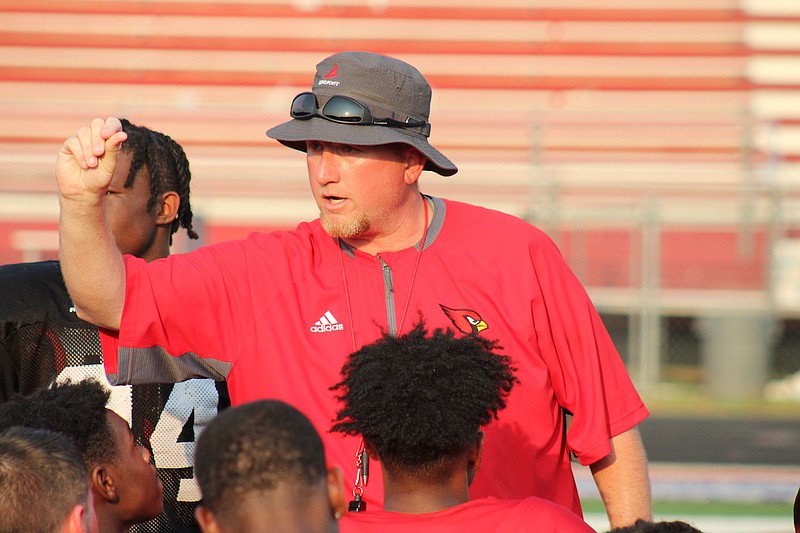 Photo By: Michael Hanich
Camden Fairview head coach Nick Vaughn talks to his team after the Spring Scrimmage Game.