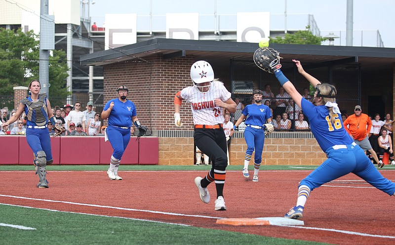 Ashley Chambers, center, runs to first base for Nashville during the Arkansas State 4A Girls Softball Championship Game against Valley View in Benton on Friday, May 20, 2022. Valley View would go on to win the championship game. (Arkansas Democrat-Gazette/Colin Murphey)