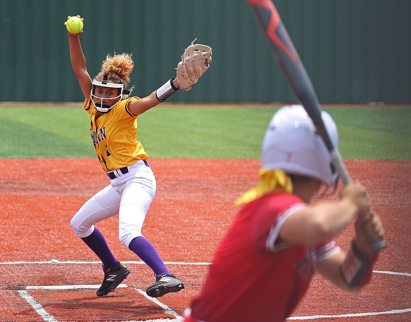 Madison Cook, left, delivers a pitch to the plate for Ashdown during the 3A Arkansas State Softball Championship game against Atkins in Benton on Saturday, May 21, 2022. (Arkansas Democrat-Gazette/Colin Murphey)