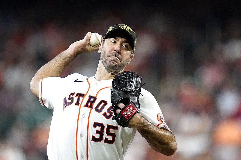 Houston Astros starting pitcher Justin Verlander throws during the first inning of a baseball game against the Texas Rangers Saturday, May 21, 2022, in Houston. (AP Photo/David J. Phillip)