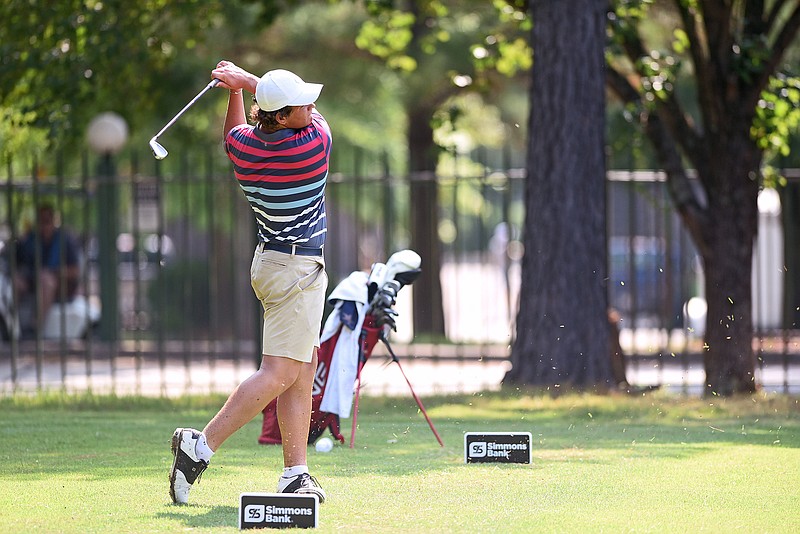 Wil Griffin tees off from the 12th hole while competing in the Arkansas State Golf Association Junior Match Play Championship semifinals on July 23, 2021, at Eagle Hill Golf Course in Little Rock. Griffin will be playing in the final qualifying round for the US Open on June 6. - Photo by Staci Vandagriff of Arkansas Democrat-Gazette