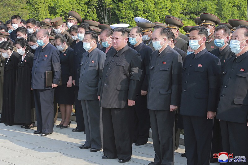 In this photo provided by the North Korean government, North Korean leader Kim Jong Un, center, attends a ceremony for Marshal of the Korean People's Army Hyon Chol Hae at a cemetery in Pyongyang, North Korea Sunday, May 22, 2022. Independent journalists were not given access to cover the event depicted in this image distributed by the North Korean government. The content of this image is as provided and cannot be independently verified. Korean language watermark on image as provided by source reads: &quot;KCNA&quot; which is the abbreviation for Korean Central News Agency. (Korean Central News Agency/Korea News Service via AP)