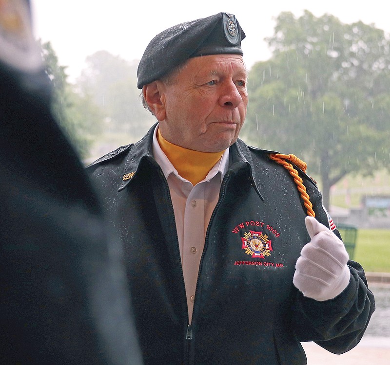 Missouri Honor Guard member Alan Nichols speaks Tuesday, May 24, 2022, during an event marking Memorial Day at Hawthorn Memorial Gardens. (Kate Cassady/News Tribune photo)