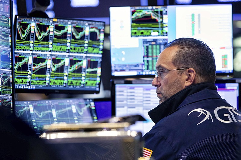 In this photo provided by the New York Stock Exchange, specialist Anthony Matesic works on the trading floor, Monday, May 23, 2022. Stocks rallied in afternoon trading on Wall Street Monday following seven weeks of declines that nearly ended the bull market that began in March 2020. (David L. Nemec/New York Stock Exchange via AP)