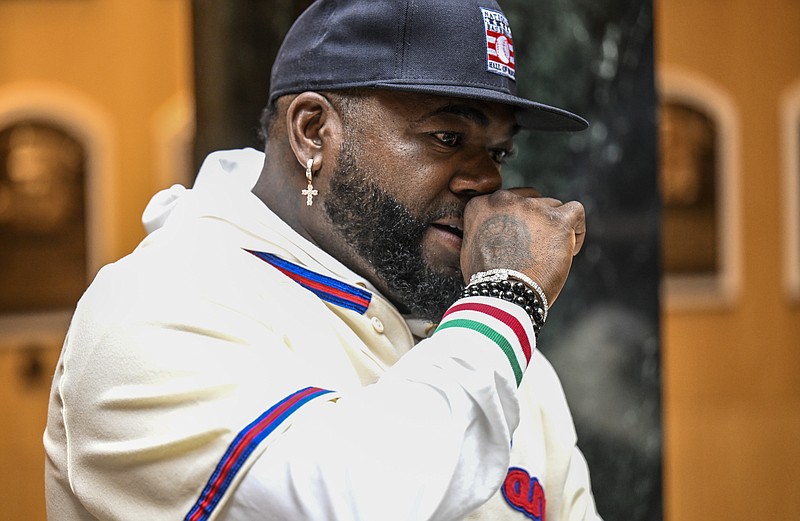 Baseball Hall of Fame inductee David Ortiz speaks to reporters during a news conference after his orientation tour of the Baseball Hall of Fame and Museum Monday, May 2, 2022, in Cooperstown, N.Y. The former Boston Red Sox player will be inducted on July 24. (AP Photo/Hans Pennink)