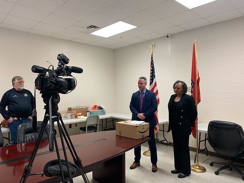 Jared Harper, center left, with the Little Rock Office of the DEA, and Connie Overton, right, with the New Orleans DEA division office, speak to media Monday, March 7, 2022, at the Sevier County Sheriff's Office in De Queen, Arkansas. Eight federal indictments have been issued in an investigation into opioid abuse at Lansdell Clinic and pharmacy locations in Southwest Arkansas. (Staff photo by Lori Dunn)