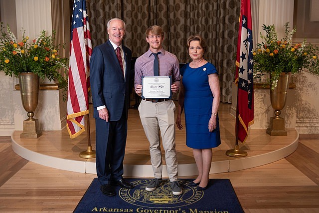 Pictured from left: Gov. Asa Hutchinson, Landon Wright and Susan Hutchinson attend the Governor’s Scholastic Honors Day held at the Governor’s Mansion on May 7, 2022. (Photo courtesy of Ashdown Public Schools)