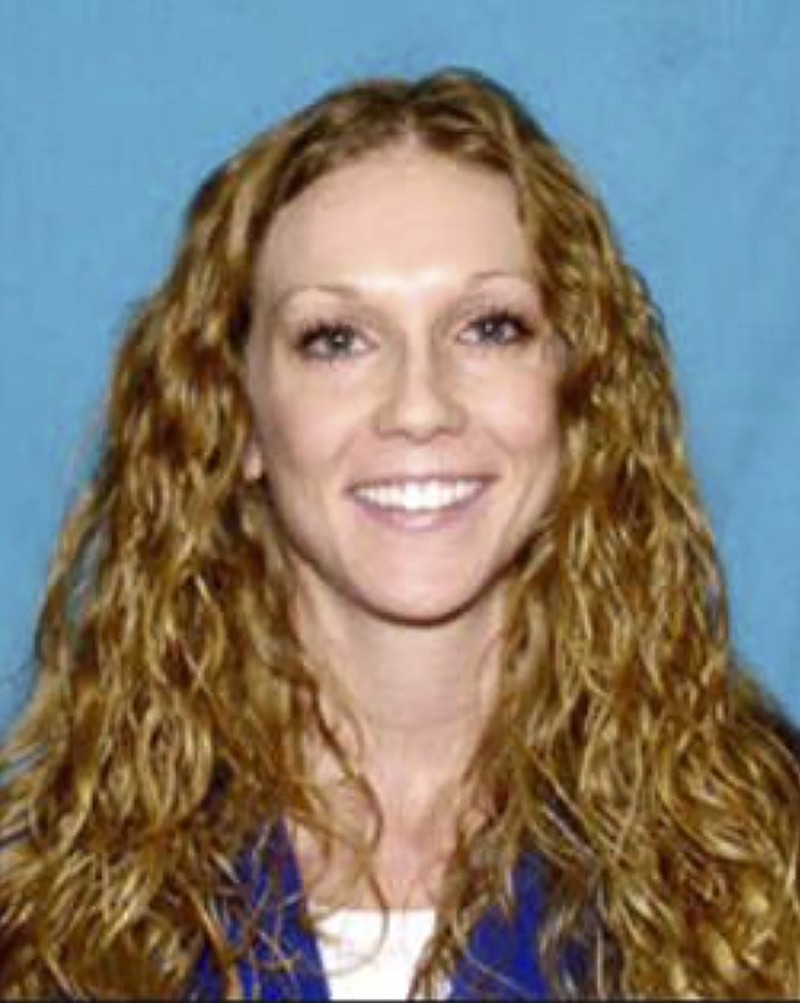 This undated photo provided by the U.S. Marshals Service shows Kaitlin Marie Armstrong. Police were searching Monday, May 23, 2022, for Armstrong, who is suspected in the fatal shooting of a professional cyclist at an Austin, Texas, home. The body of 25-year-old Anna Moriah "Mo" Wilson, of San Francisco, was found May 11. (U.S. Marshals Service via AP)