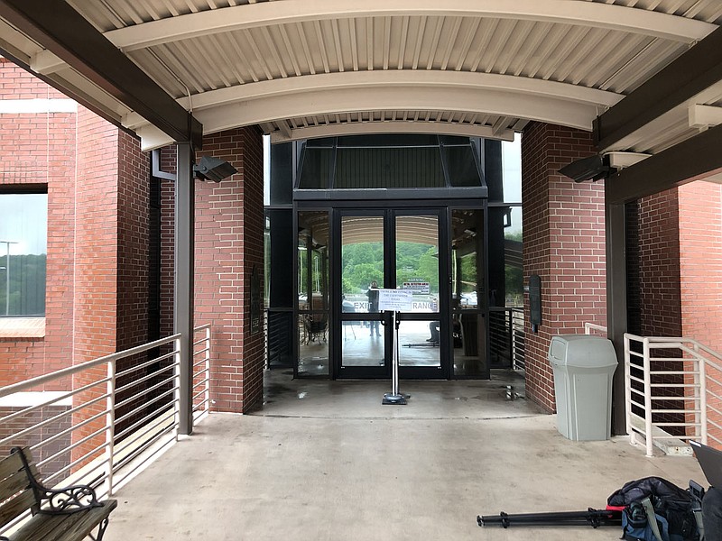 The front doors are seen locked Tuesday, May 24, 2022, at the Washington County Courthouse in Fayetteville. The power went out Tuesday on Election Day. (NWA Democrat-Gazette/Stacy Ryburn)