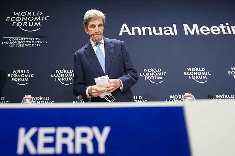 John Kerry, United States Special Presidential Envoy for Climate, arrives for a news conference during the World Economic Forum in Davos, Switzerland, Wednesday, May 25, 2022. The annual meeting of the World Economic Forum is taking place in Davos until May 26, 2022. (AP Photo/Markus Schreiber)