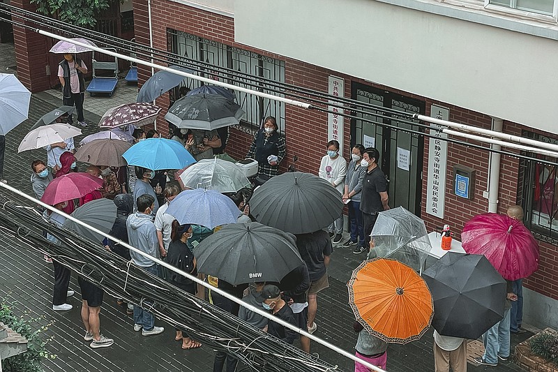 In this photo taken on May 24, 2022 and released by Weronika Truszczynska, residents of a compound banded together to complain to their community about opening up in Shanghai. Residents in China's largest city of Shanghai have become bolder in demanding the lifting or easing of coronavirus restrictions that have left millions locked up in their compounds for almost two months. (Weronika Truszczynska via AP)