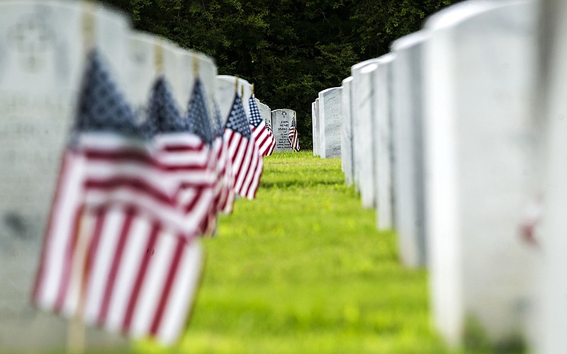 Headstones sit in misaligned rows at the Arkansas State Veterans Cemetery in North Little Rock on Thursday, May 26, 2022.
(Arkansas Democrat-Gazette/Stephen Swofford)