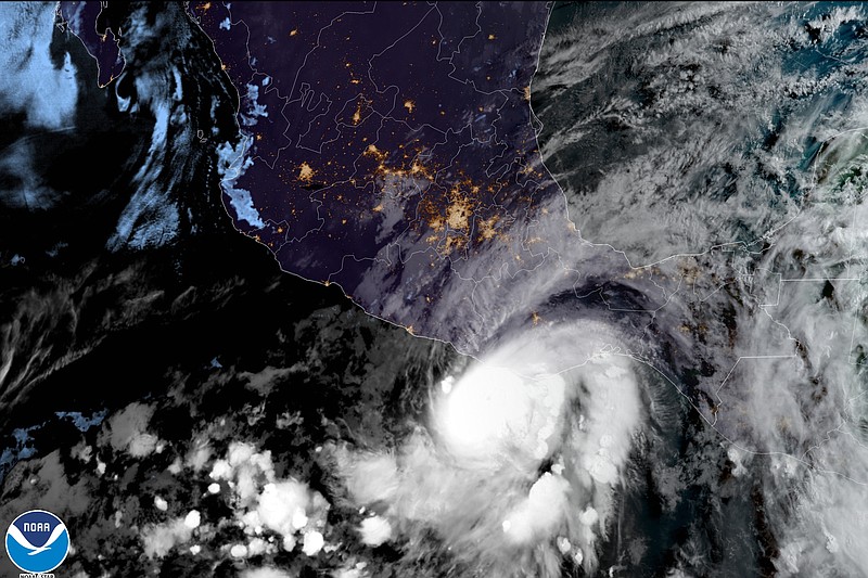 This satellite image made available by NOAA shows Hurricane Agatha off the Pacific coast of Oaxaca state, Mexico on Monday, May 30, 2022, at 8:30 a.m. EDT. (NOAA via AP)