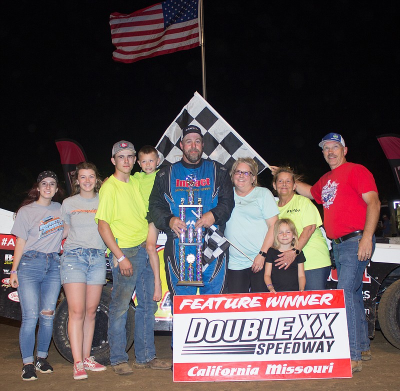 Submitted 
John Clancy of California drove himself right back into victory lane Sunday night at Double-X Speedway.