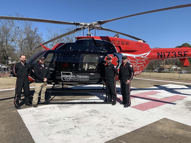 The crew of Survival Flight - 17 poses for a photo. The base at the Medical Center of South Arkansas is the sixth base in Arkansas for the Survival Flight company. (Contributed)