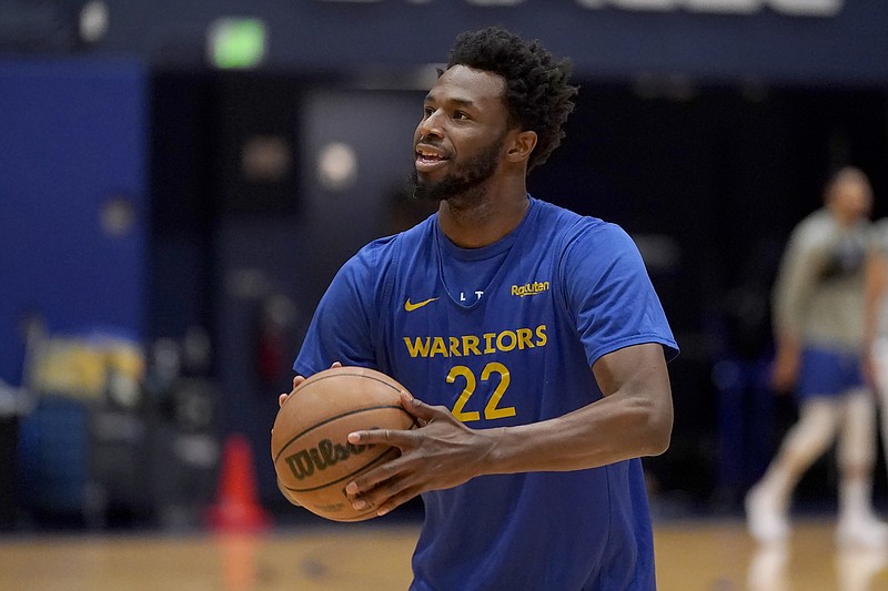Golden State Warriors forward Andrew Wiggins shoots during NBA basketball practice in San Francisco, Tuesday, May 31, 2022. The Warriors are scheduled to host the Boston Celtics in Game 1 of the NBA Finals on Thursday. (AP Photo/Jeff Chiu)