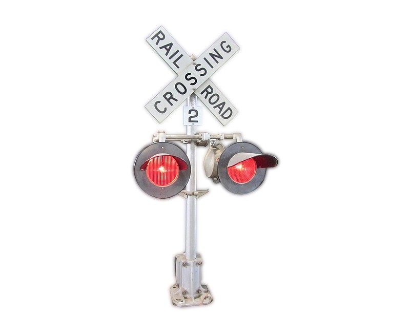 A lighted crossing sign is among the museum’s many railroading artifacts. (Special to the Democrat-Gazette/Jack Schnedler)