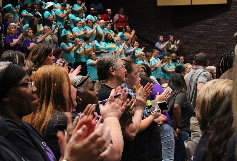 Teachers cheer during the closing session of the 2021/2022 school year for the El Dorado School District on Friday, May 27. (Caitlan Butler/News-Times)