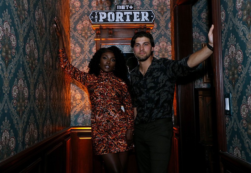 Loren Lott (left) and Luke Bilyk attend the Los Angeles launch event for “The Porter” on BET+. (Getty Images for BET+/TNS/Phillip Faraone)