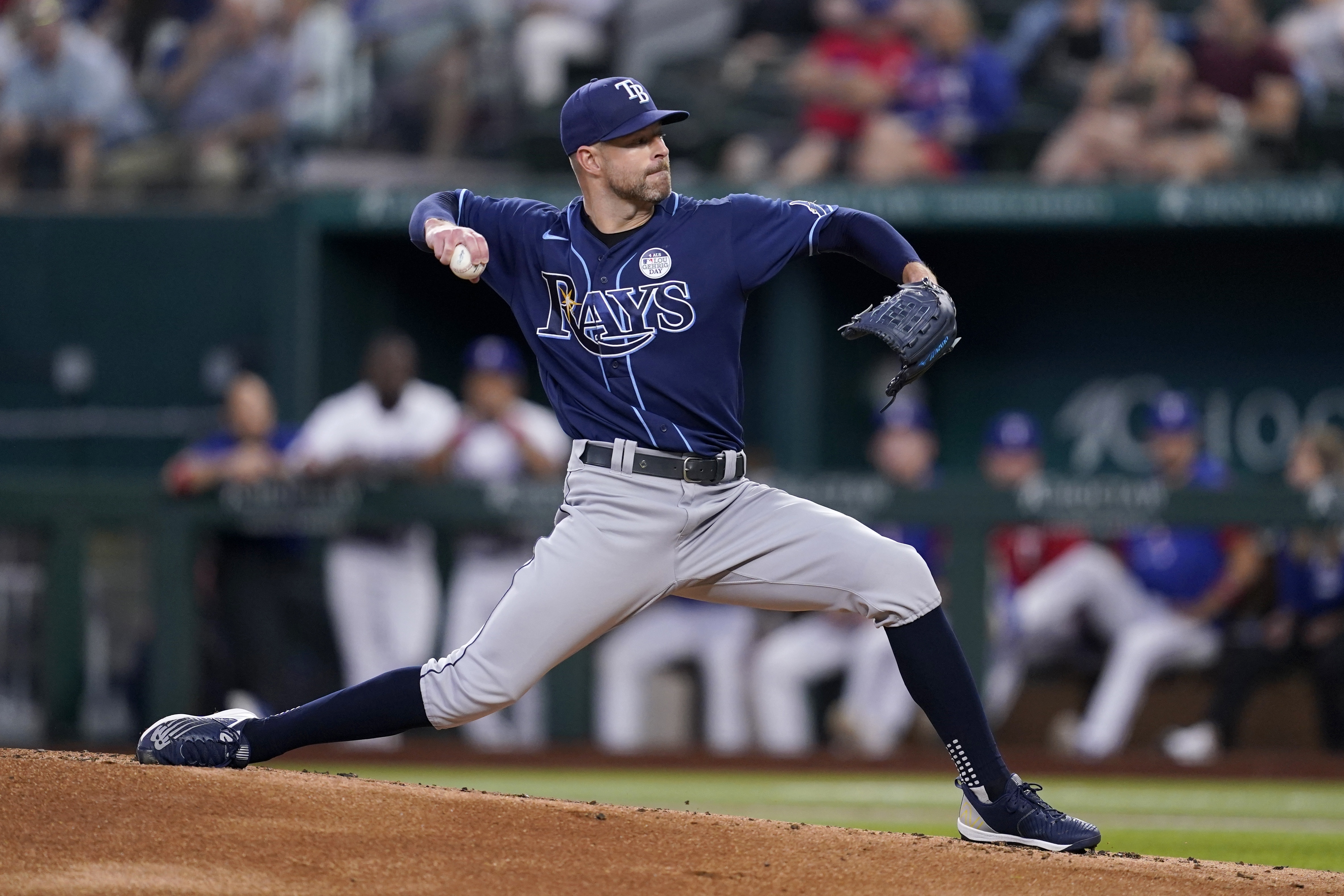 Corey Kluber pulled from Rangers debut after one inning because of