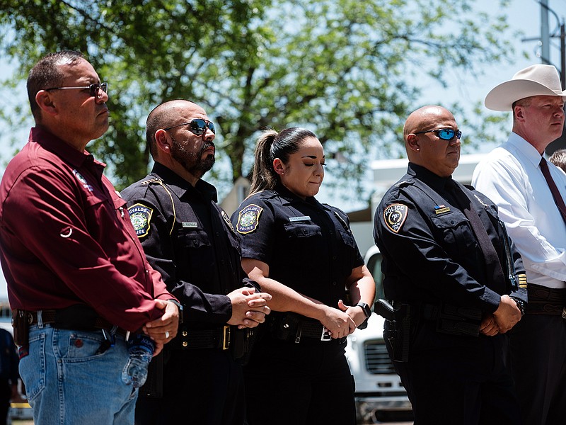 FILE — Chief Pete Arredondo, second from right, at a news conference in Uvalde, Texas, on May 26, 2022. Arredondo, the commander at the scene of the mass shooting at Robb Elementary School, arrived without a police radio, and decided in the first minutes on an approach that would delay a confrontation. (Christopher Lee/The New York Times)