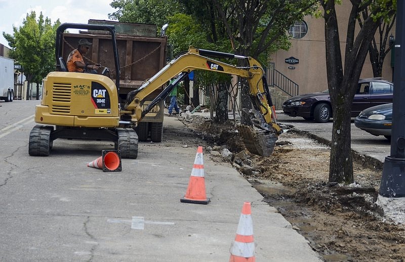 In this 2015 file photo, workers are seen continuing construction on new sidewalks around Main Street as the Murphy Arts District is being built a block over. (File photo)
