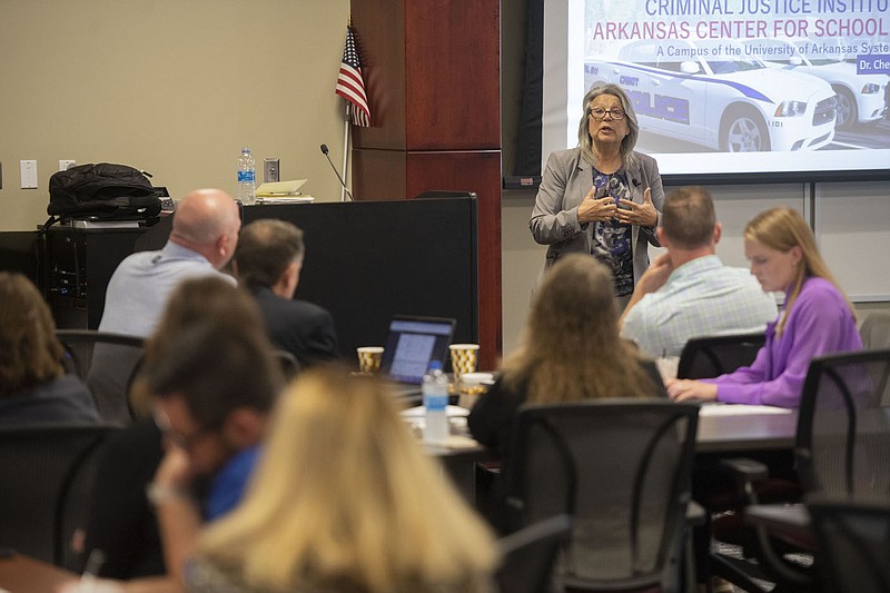 Cheryl P. May, Criminal Justice Institute director, speaks Tuesday June 7, 2022 at the Don Tyson School of Innovation in Springdale during a school safety summit. About 100 school administrators, counselors, social workers, teachers and law enforcement professionals from 26 school districts throughout Arkansas attended the event. Springdale Schools hosted the inaugural regional school safety summit.  Visit nwaonline.com/220608Daily/ for daily galleries.  (NWA Democrat-Gazette/J.T. Wampler)