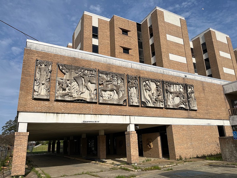 "Arkansas History," a sculptural frieze by Tony Sheets and Richard Ellis, is seen in its original location along an east-facing wall of Warner Brown hospital. (Courtesy of Gay Bechtelheimer/Special to Live Union County)