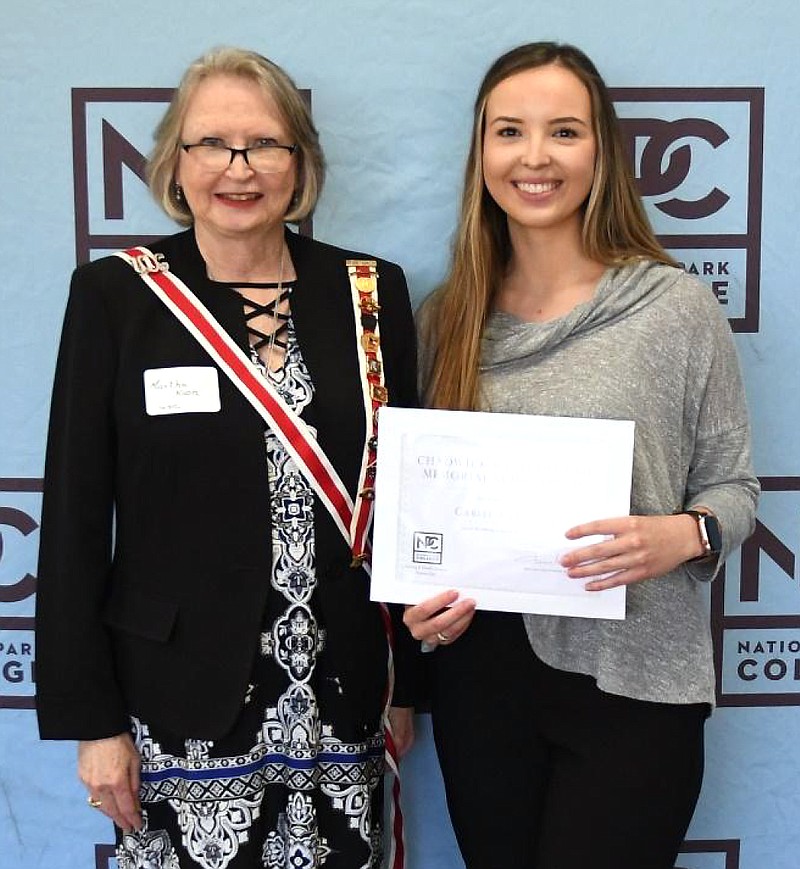 Carlee Carmon, right, receives the Chadwick-Butterworth Memorial Scholarship from Hot Springs Chapter No. 80 UDC’s President Martha Koon during NPC Nursing and Health Science Day on April 14. - Submitted photo