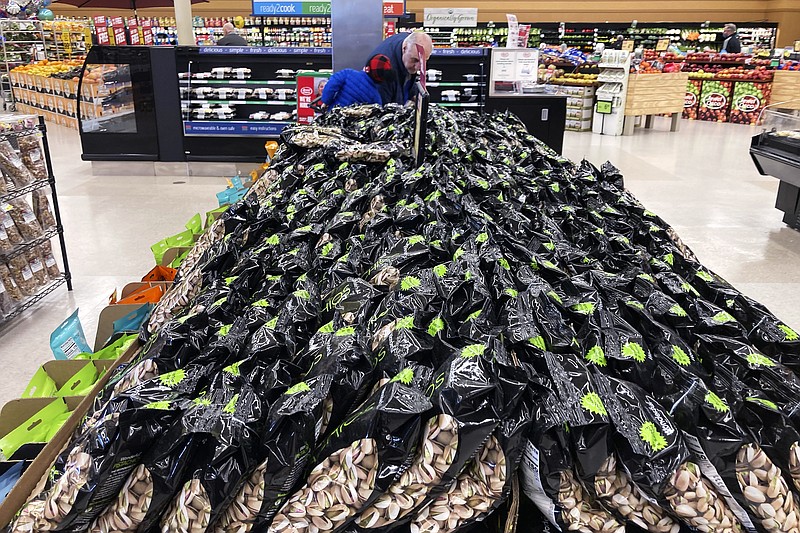 FILE - Bags of Pistachios are displayed at a grocery store in Mount Prospect, Ill., on, April 1, 2022. Consumer prices surged 8.6% last month from 12 months earlier, faster than April’s year-over-year surge of 8.3%, the Labor Department said Friday, June 10, 2022. (AP Photo/Nam Y. Huh)