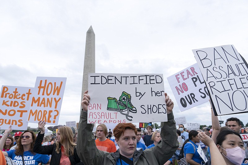 People participate in the second March for Our Lives rally in support of gun control in front of the Washington Monument, Saturday, June 11, 2022, in Washington. The rally is a successor to the 2018 march organized by student protestors after the mass shooting at a high school in Parkland, Fla. (AP Photo/Jose Luis Magana)