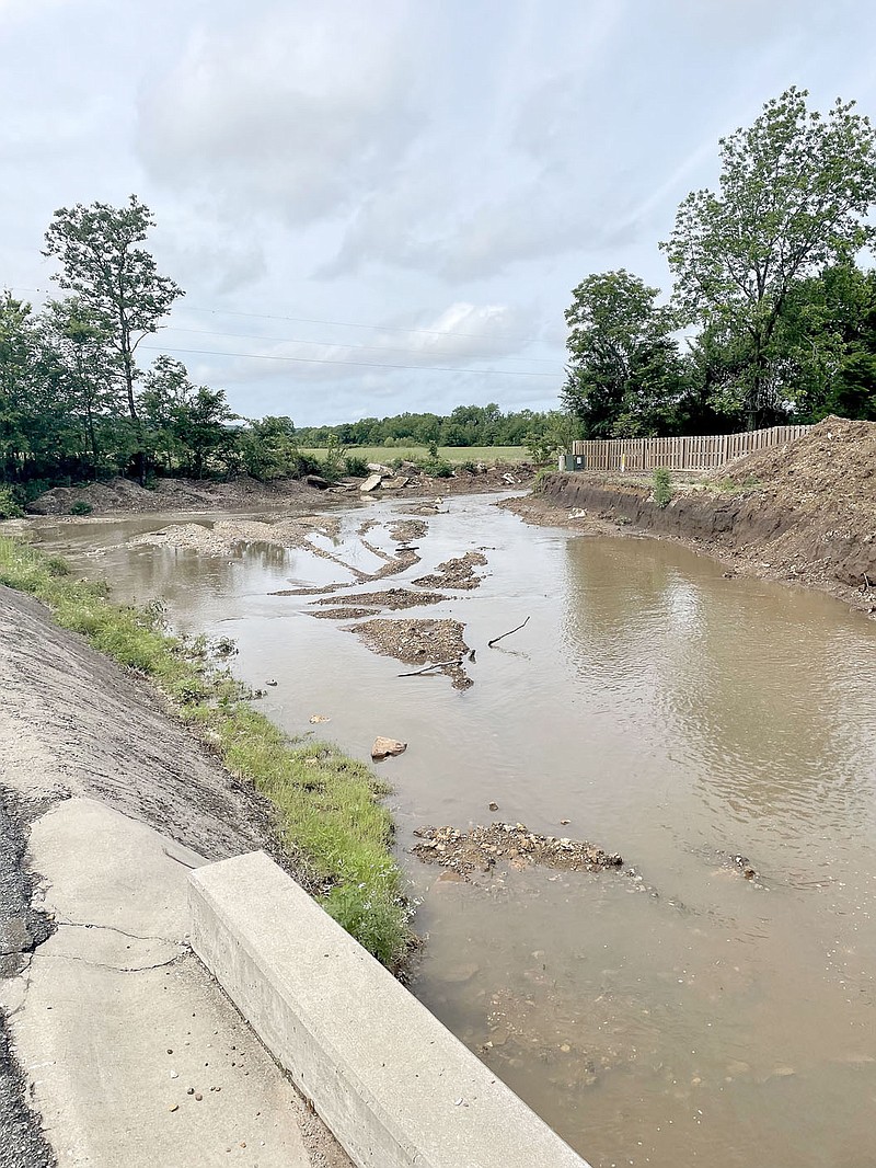 PHOTO COURTESY CITY OF FARMNGTON
Farmington City Council approved an ordinance last week to install a retaining wall to improve storm drainage for Rosebay Lane in Meadowsweet subdivision. The wall will go along the bank of this area that flows into a creek behind the houses on Rosebay Lane.