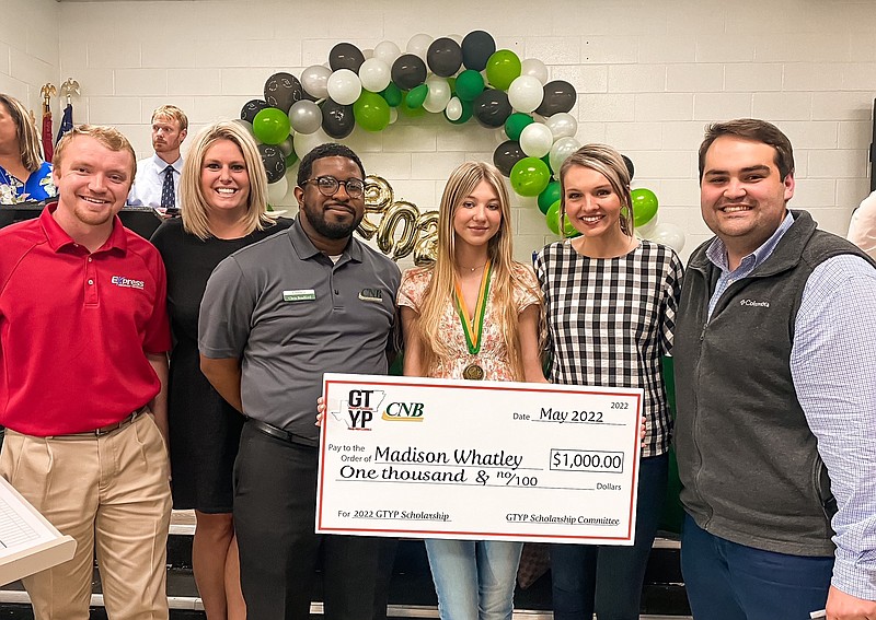 Madison Whatley (Genoa Central High School) is presented with a $1,000 scholarship from the Greater Texarkana Young Professionals. (Submitted photo)