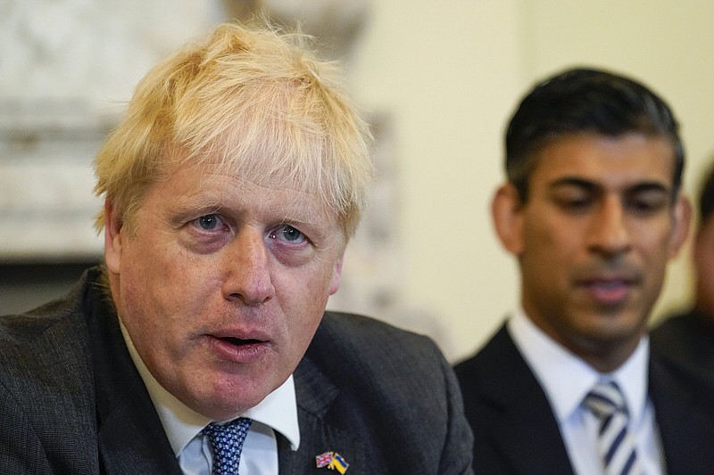 Britain's Prime Minister, Boris Johnson speaks during a Cabinet meeting at 10 Downing Street, in London, Tuesday, June 14, 2022. (AP Photo/Alberto Pezzali, Pool)