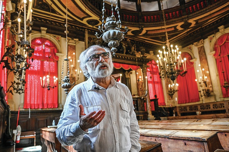 Dario Calimani, the president of the Jewish Community of Venice, poses inside the Spanish Schola Synagogue in Venice, northern Italy, Wednesday, June 1, 2022. The Spanish Schola, founded about 1580, but rebuilt in the first half of the 17th century, is the biggest of the Venetian synagogues. Venice’s Jewish ghetto is considered the first in Europe and one of the first in the world, and a new effort is underway to preserve its 16th century synagogues for the Jews who have remained and tourists who pass through. (AP Photo/Chris Warde-Jones)