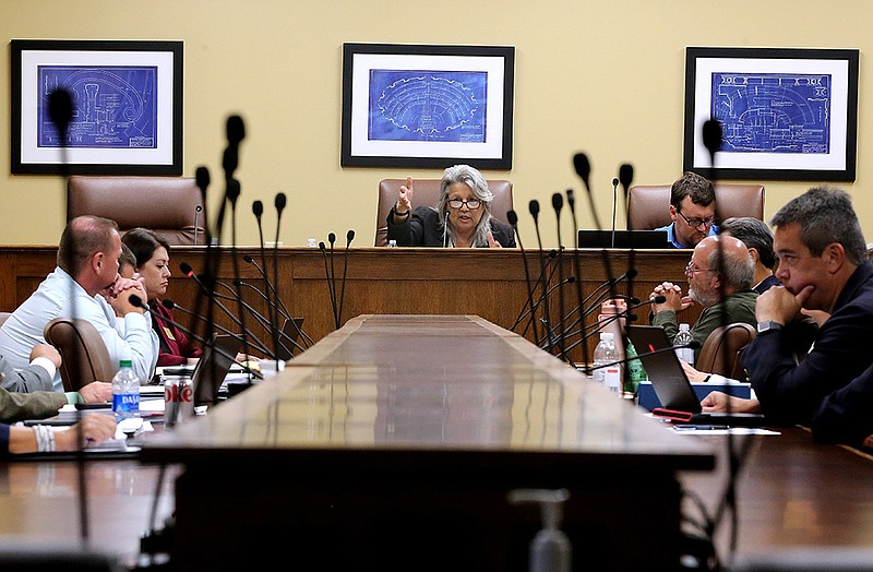 Cheryl May (center), chair of the Arkansas School Safety Commission, speaks during the commission's first meeting on Tuesday, June 14, 2022, at the state Capitol in Little Rock. Gov. Asa Hutchinson reinstated the commission last week in the wake of recent events around the nation and an increased concern about safety in Arkansas schools. 
(Arkansas Democrat-Gazette/Thomas Metthe)