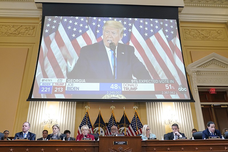 A video exhibit plays as the House select committee investigating the Jan. 6 attack on the U.S. Capitol continues to reveal its findings of a year-long investigation, at the Capitol in Washington, Monday, June 13, 2022. (AP Photo/Susan Walsh)