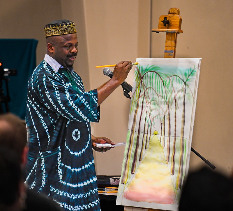 Nigerian artist Ibiyinka olufemi alao visited Jefferson City Correctional Center Wednesday, June 15, 2022, to talk to offenders about using art as an outlet and as a way to convey feelings. He said some people can make music or write songs and artists can draw or paint to express their emotions. Following his speech, he demonstrated how to make a watercolor painting in step-by-step detail. (Julie Smith/News Tribune photo)