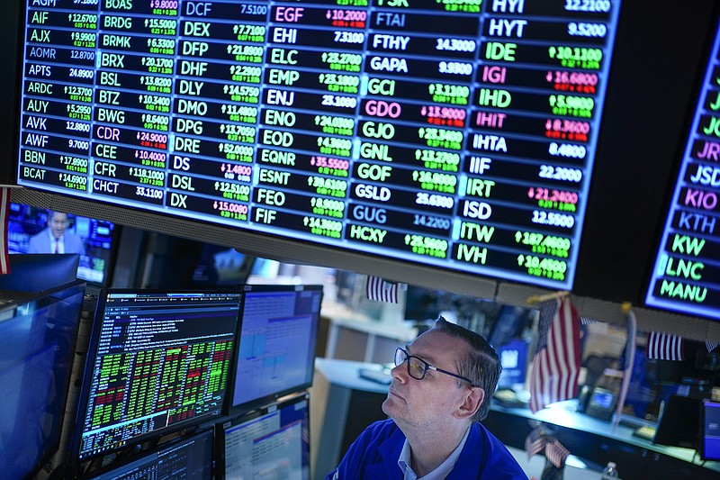 Traders work on the floor at the New York Stock Exchange in New York, Wednesday, June 15, 2022. U.S. stocks are rallying Wednesday and are on track for their first gain in six days. But more turbulence may be ahead when the Federal Reserve announces in the afternoon how sharply it's raising interest rates. (AP Photo/Seth Wenig)