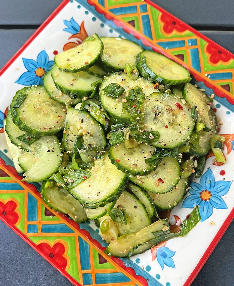 A crisp and cool cucumber salad is a perfect side for spicy Gochujang chicken. (Gretchen McKay/Pittsburgh Post-Gazette/TNS)