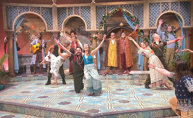 Steven Marzolf as Benedick and Elizabeth “Betsy” Jilka as Beatrice (center) lead the final pose in the finale, "The Games of Love," in the Arkansas Shakespeare Theatre’s production of William Shakespeare’s “Much Ado About Nothing.” (Special to the Democrat-Gazette/Chad Bradford)