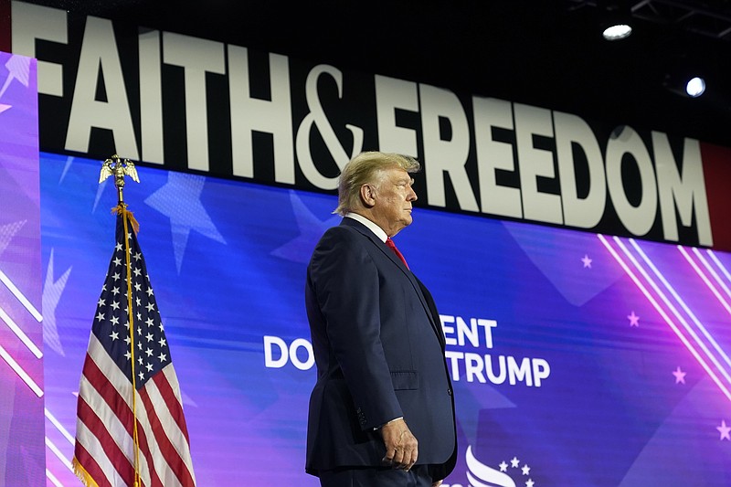 Former President Donald Trump walks on to the stage to speak at the Road to Majority conference Friday, June 17, 2022, in Nashville, Tenn. (AP Photo/Mark Humphrey)