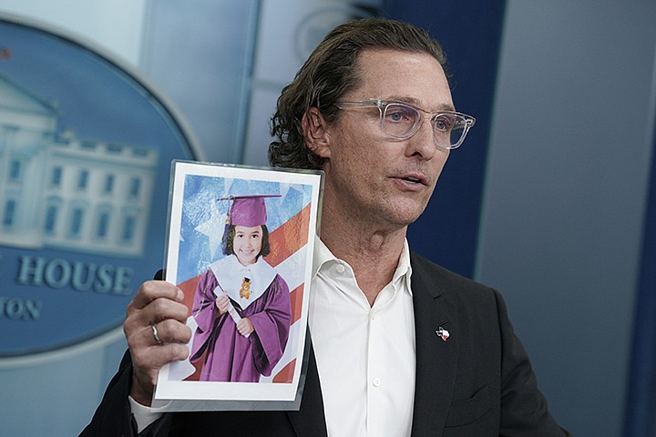 Actor Matthew McConaughey holds a photo of a victim in the recent mass shooting at an elementary school in Uvalde, Texas, during a news briefing at the White House in Washington, D.C., on Tuesday, June 7, 2022. (Yuri Gripas/Abaca Press/TNS)