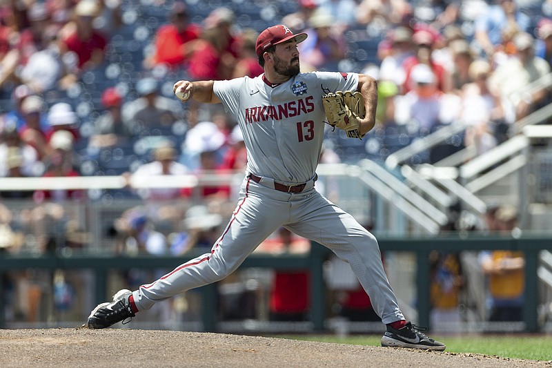 Arkansas starting pitcher Connor Noland (13) throws a pitch against Stanford in the first inning during an NCAA College World Series baseball game Saturday in Omaha, Neb. - Photo by John Peterson of The Associated Press